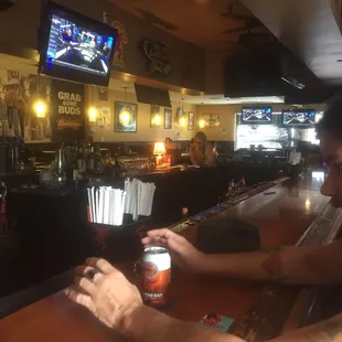 a man sitting at the bar