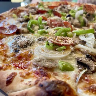Della Casa pizza.  Crispy enough. Doughy enough. Toppings were more than sufficient.
