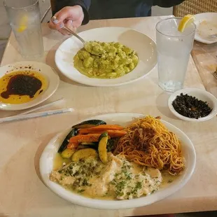Chicken limone with spicy angel hair with bolognese.