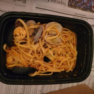 a bowl of pasta and clams