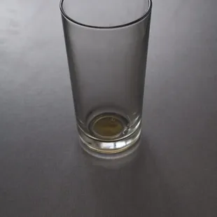 a shot glass on a table