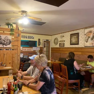 a group of people sitting at a table