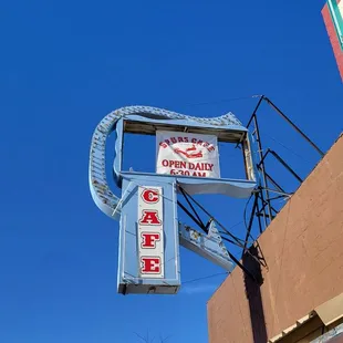 a neon sign for a restaurant