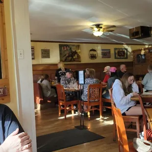 a group of people sitting at tables