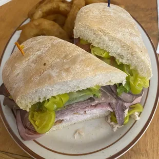 Spurs Stack Sandwich with beer batter onion rings. Great taste.