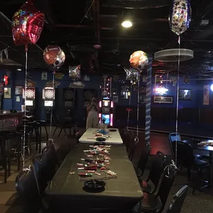 a long table with plates of food on it