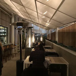 For big groups, sit outside on long tables with heat lamps