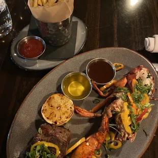 6 oz filet steak and 1/2 lobster with &quot;crab&quot; fries (old bay seasoned fries) (FMOI @FeedTheStrEATs)