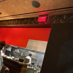 a man working in a restaurant kitchen