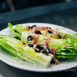 HEART OF ROMAINE
 Dried cherries, shaved almonds, prosciutto, limoncello ginger vinaigrette