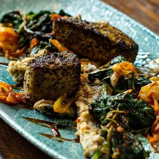 YELLOWFIN TUNA Tuna, lemon pepper crusted, portabella mushroom schnitzel, sauteed spinach and kimchi, sweet soy