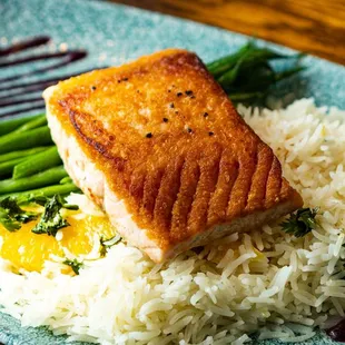 SIXTY SOUTH ANTARCTIC SALMON
 Pan seared, orange cilantro basmati, French beans, blueberry mango vinaigrette