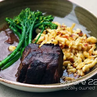CERTIFIED ANGUS BEEF BOURBON BRAISED SHORT RIB Boneless, garlic &amp; butter spaetzles, broccolini, Knob Creek au jus
