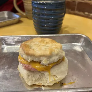 (From the closest) Ham and cheese biscuit sandwich.  Caramel latte.  Almond chai latte.