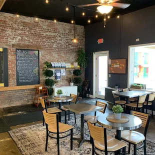 tables and chairs in a coffee shop