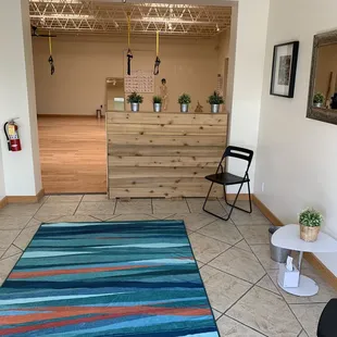 Reception area looking into fitness space.