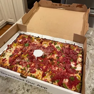 Large square pizza with ham, green pepper, red onion and mild peppers - delish!