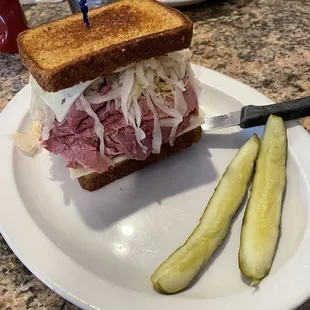 Ruben and pickles (waffle fries in background)