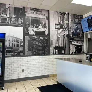 a black and white photo of a restaurant