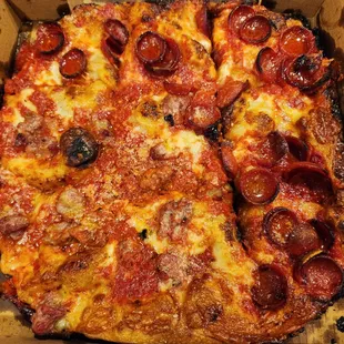 Half pepperoni, half sausage