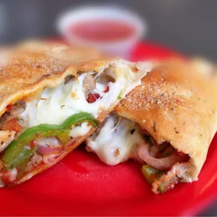 Italian sausage and green pepper calzone. Added pepperoni and onion. My favorite.