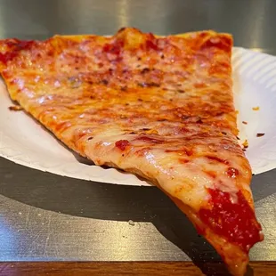 Plain cheese pizza slice   $2.50 + tip