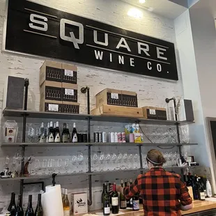 a man standing at the bar