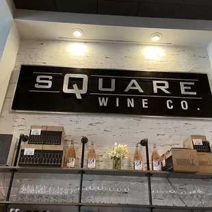 shelves of wine glasses and bottles