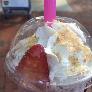 a strawberry shortcake in a plastic cup