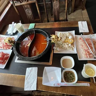 Lamb, fatty beef, pork belly, spicy/mild soup, shrimp paste, corn, egg, rice cake, calamari