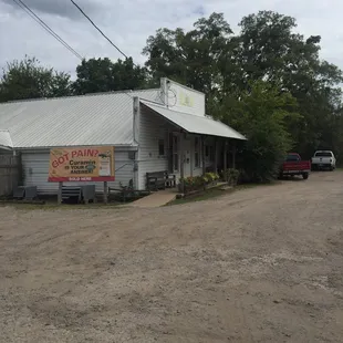 a truck parked in front of a building