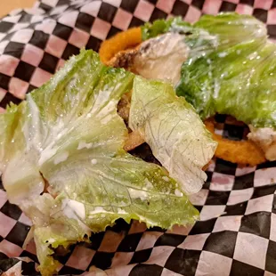 Fresh lettuce leaves inside burger