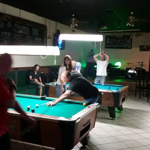 people playing pool