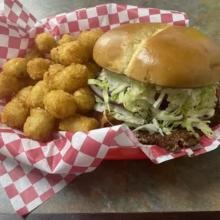 Single Squish burger with everything, bacon, cheese with tots.