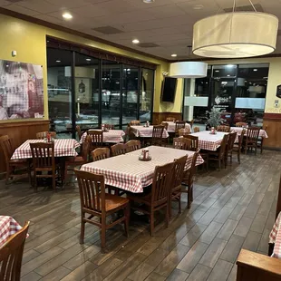 a restaurant with tables and chairs
