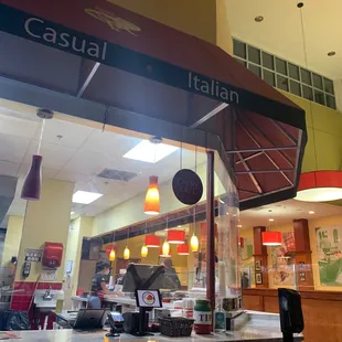 Inside picking up our Large Cheese pizza for Monday night is pizzay night