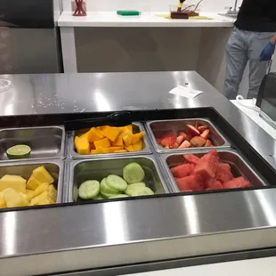 a man in a kitchen preparing food