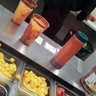 a variety of fruit and drinks