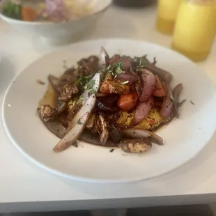 Tacu tacu with pollo saltado