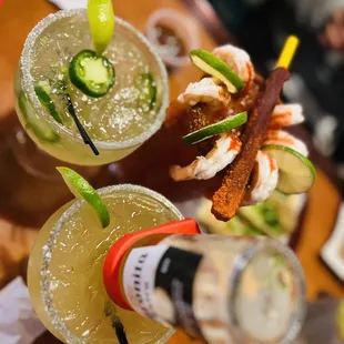 two margaritas and a bottle of beer