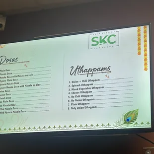 a menu displayed on a large screen