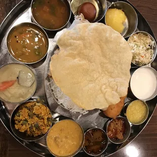 I had coupon from radio show about won thali from Anand Bhavan .I ordered Kalyana Sappadu . That guy he said it&apos;s not applicable. It sucks