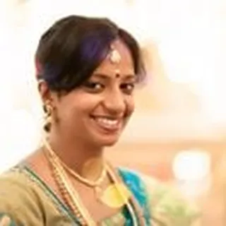 Dhiviya D.