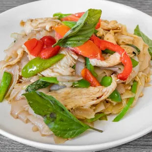 Drunken noodle. You choose any meat or if you dont want me we can make it with tofu and mixed vegetable.