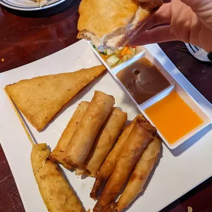 Appetizer platter with the Seven Heaven, a delicious surprise, deep fried chicken in a tortilla. Never had at a Thai restaurant
