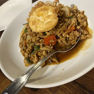 Chicken with an egg on top, but forgot the name