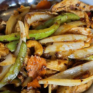 a plate of stir fried vegetables