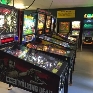 a row of pinball machines