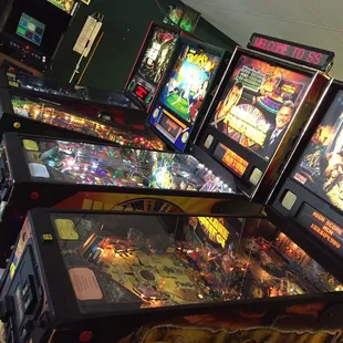 a row of pinball machines