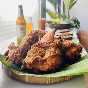 a plate of fried chicken on a table